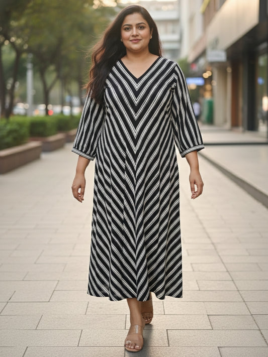 Black striped dress for women, front view, handcrafted cotton dress with relaxed fit and pockets