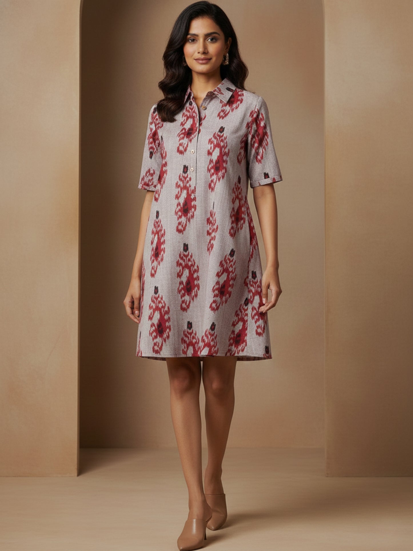 Woman wearing Ikkat Handloom weaver made fabric premium cotton short swing dress while walking, showcasing fluid movement and relaxed fit