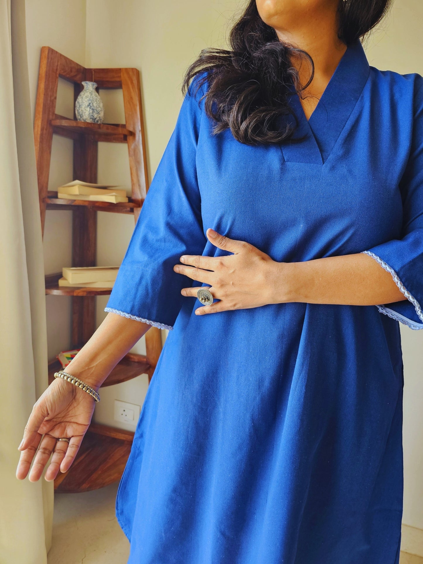 Blue solid lacework festive kurti with pants by Darzaania 