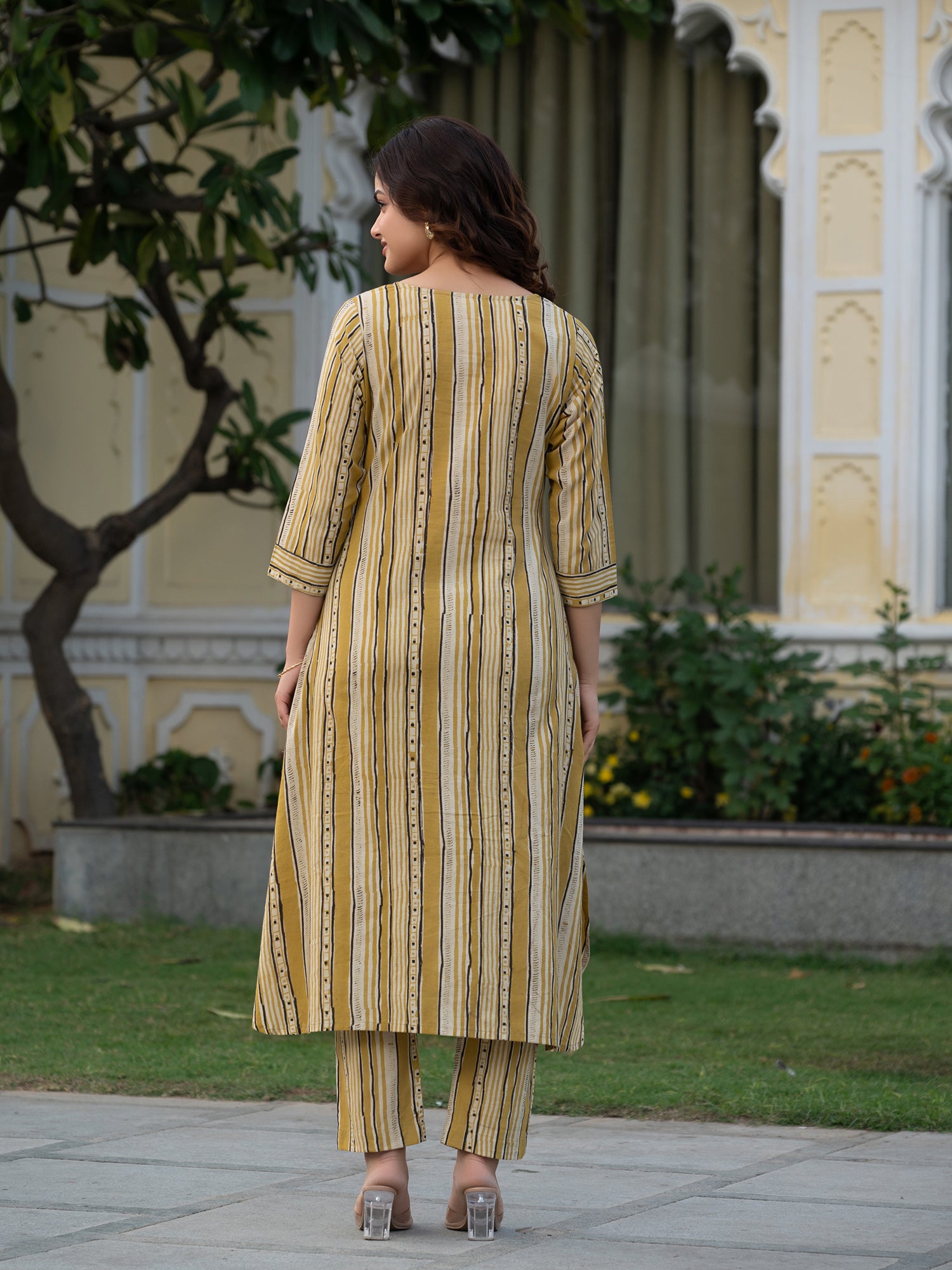 Back view of subtle mustard Ajrakh cotton co-ord set with clean silhouette and tailored finish